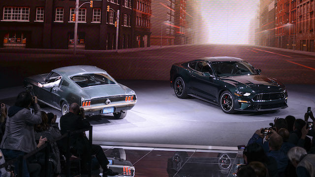 The new 2019 Mustang BULLITT shares the Ford stage at the North American International Auto Show with the original 1968 Mustang GT driven by legend Steve McQueen during filming on the movie “Bullitt.”